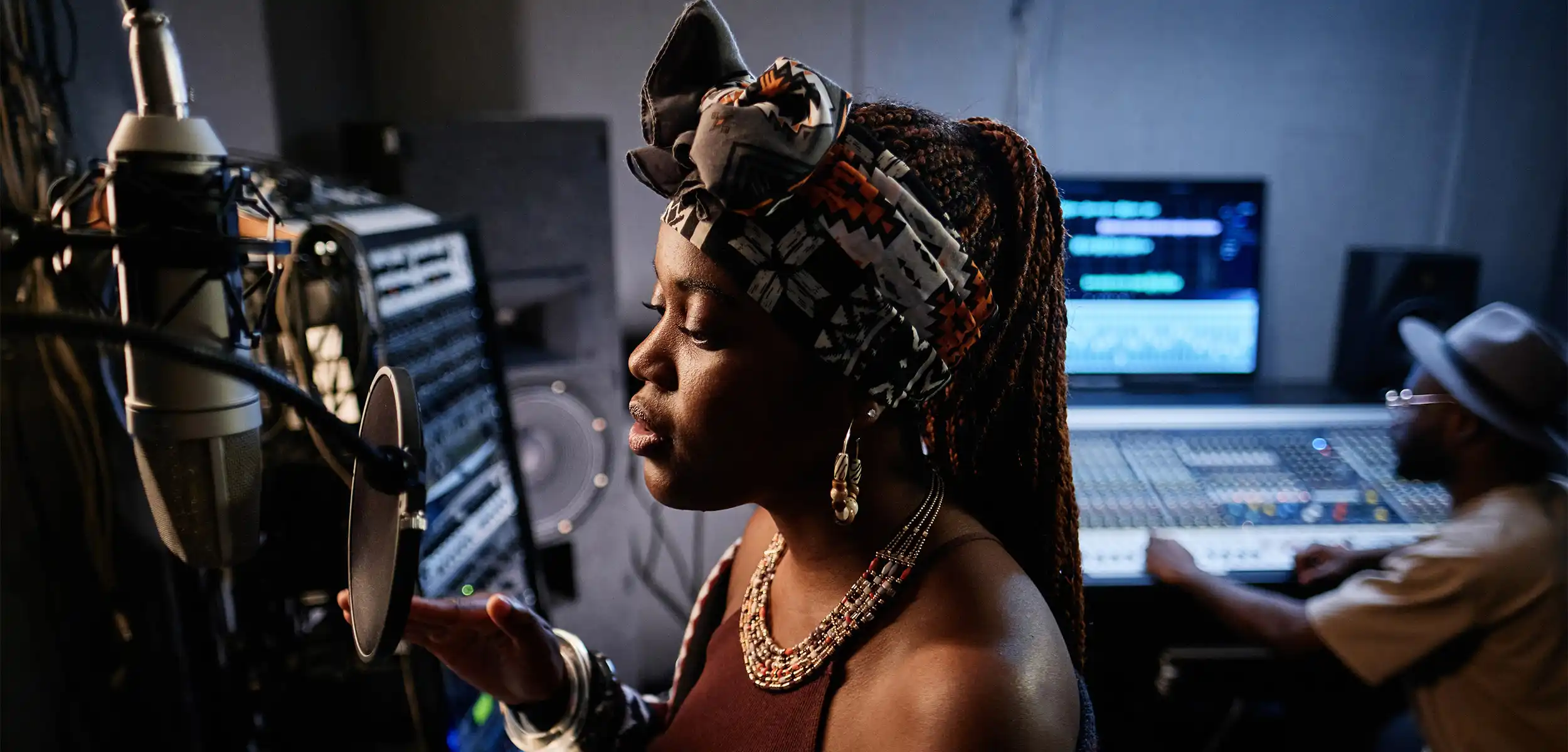 a woman with a headband and a scarf on her head